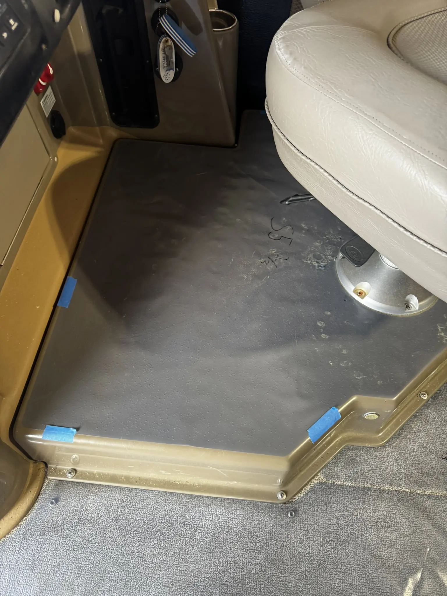 Vehicle interior floor mat and seat.