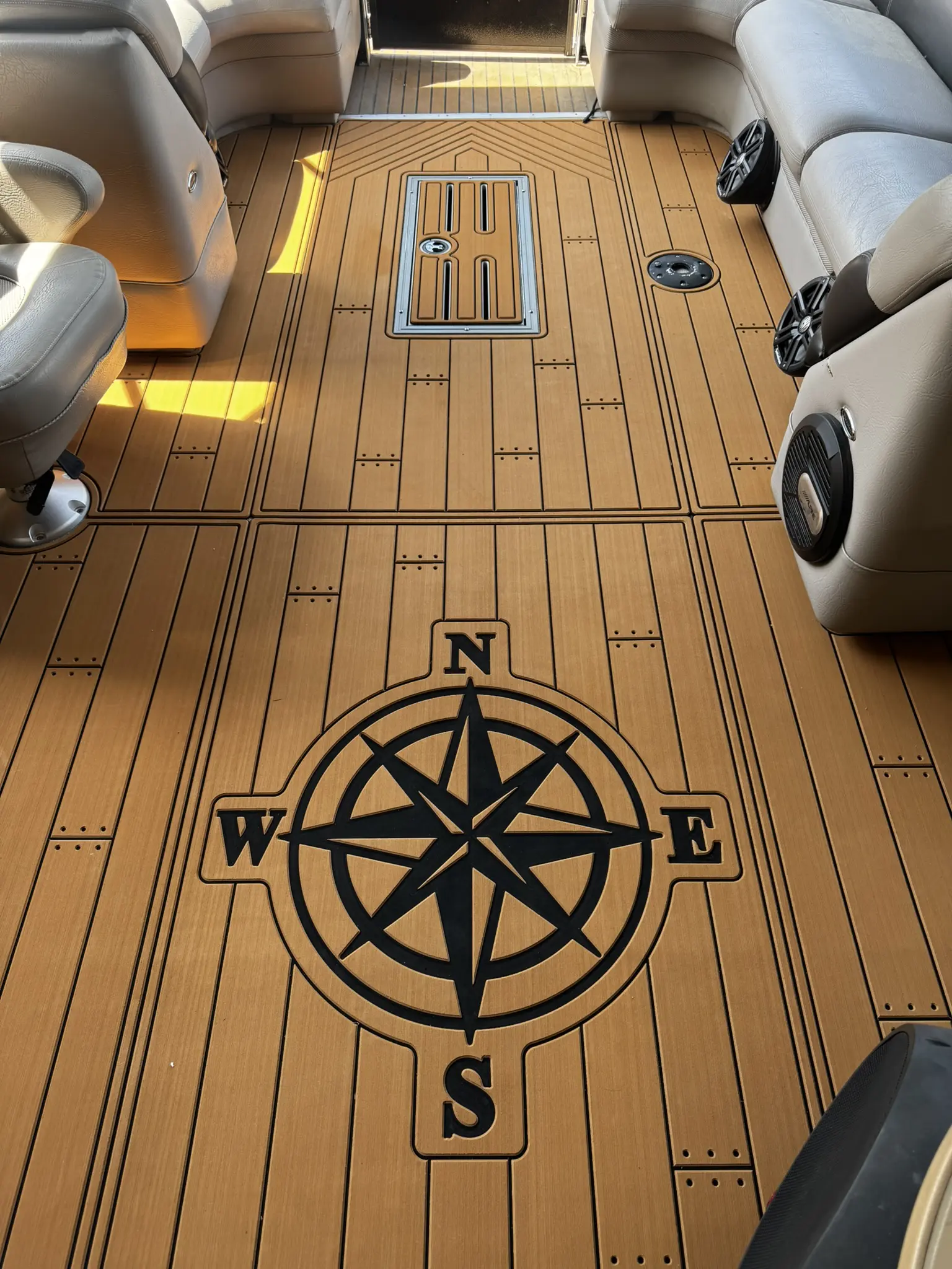 Boat deck with compass rose design.