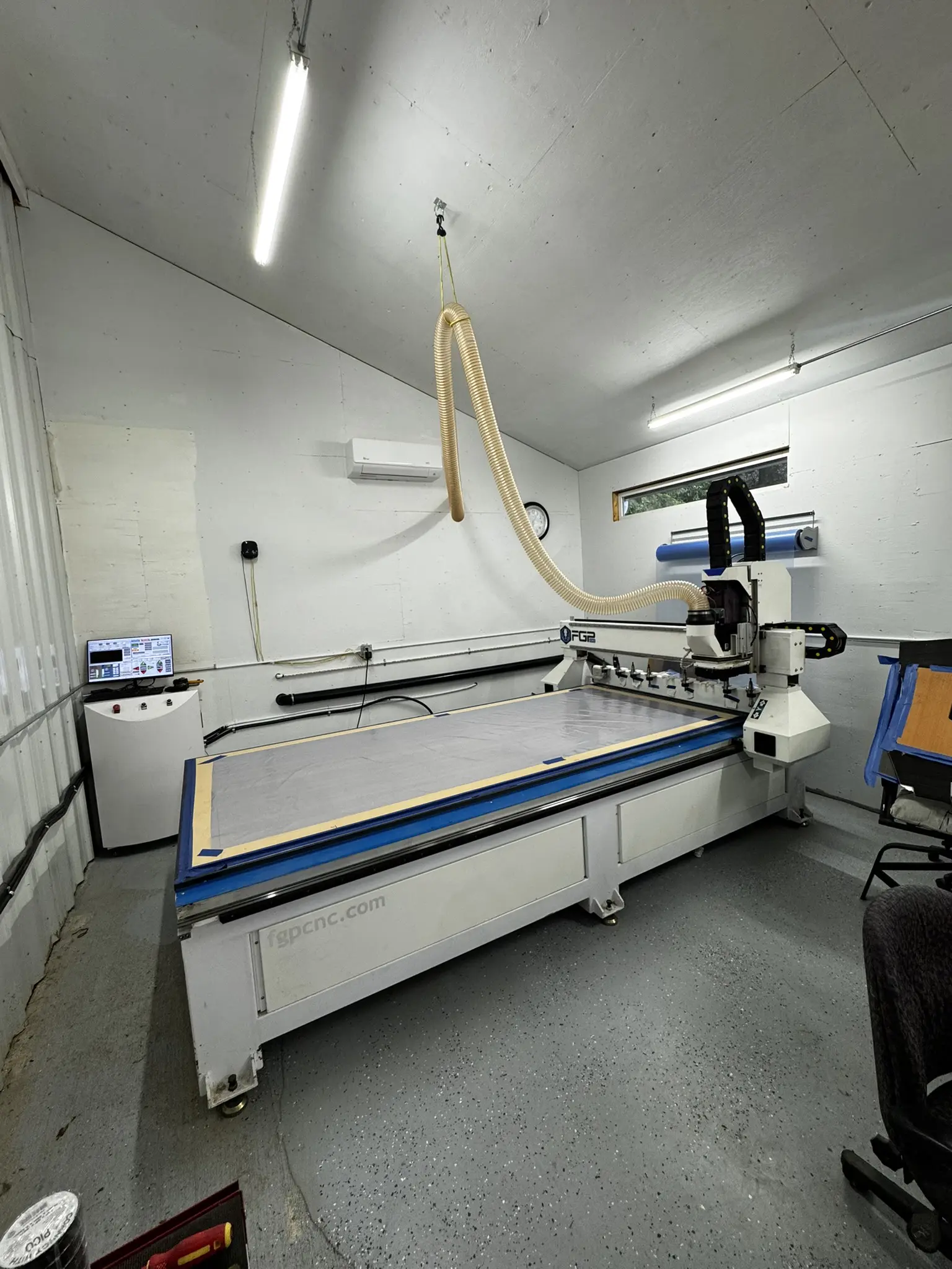 CNC machine in a workshop setting.