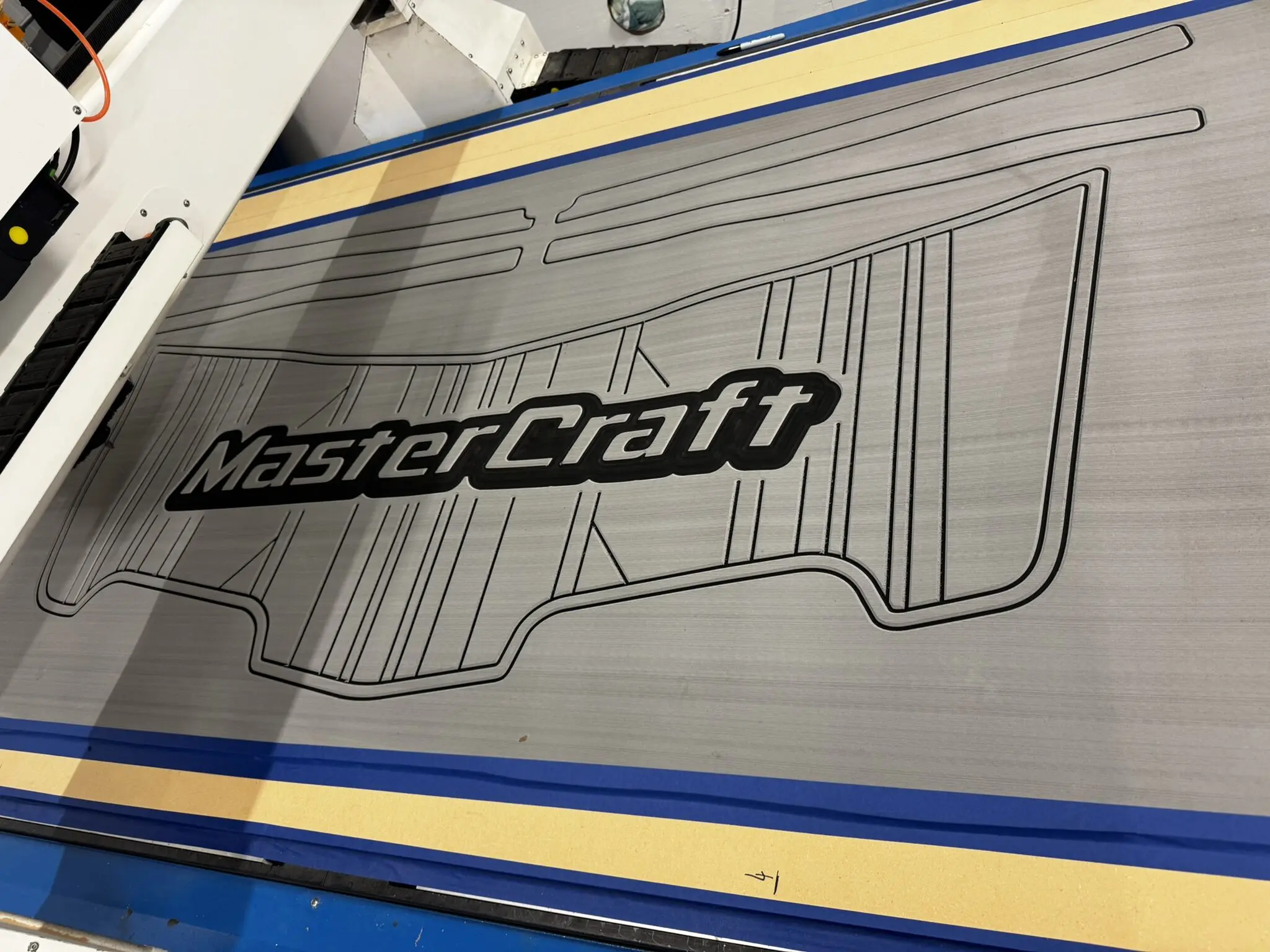 MasterCraft logo on boat flooring mat.
