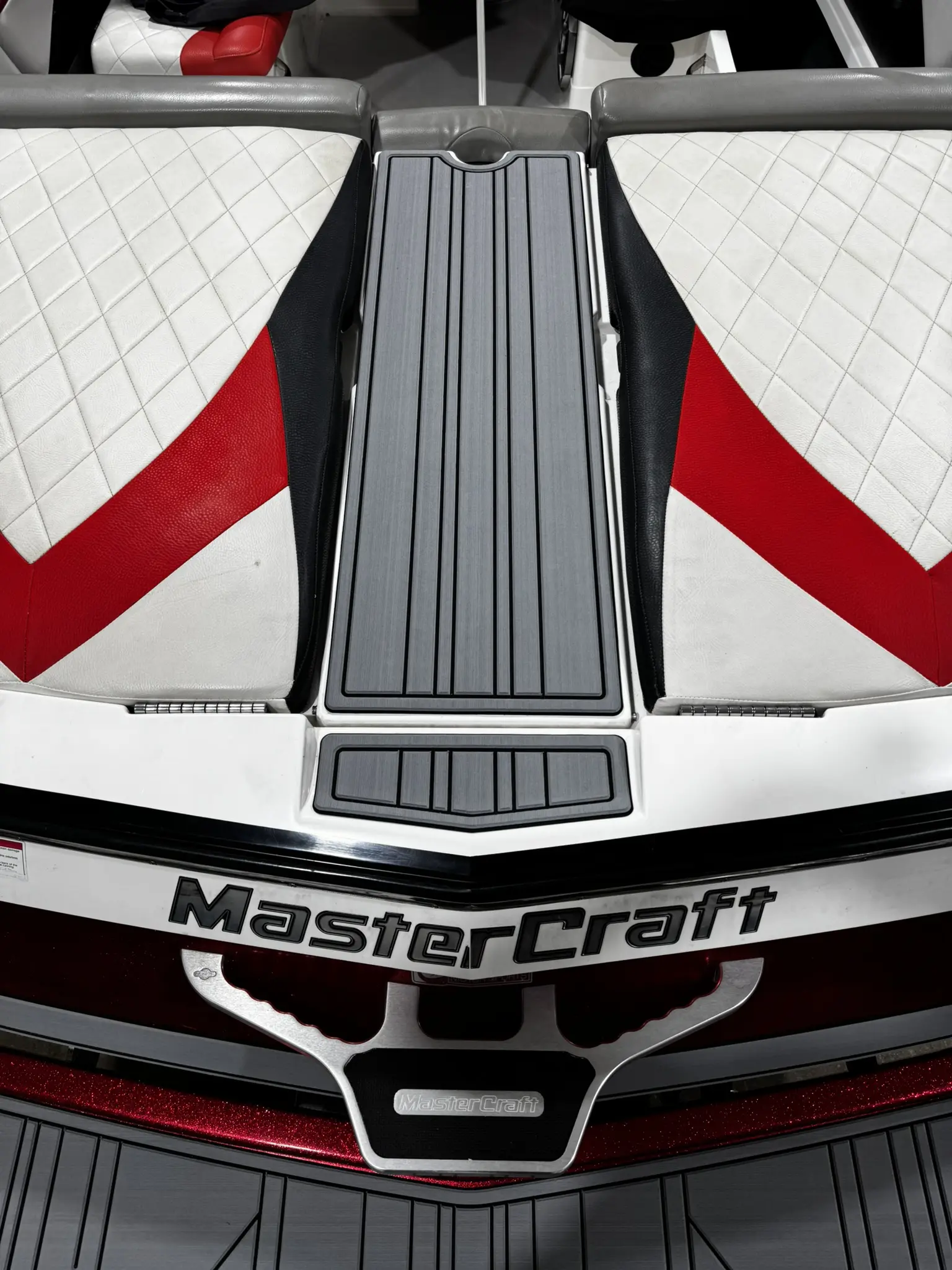 Boat interior with MasterCraft logo and upholstery.
